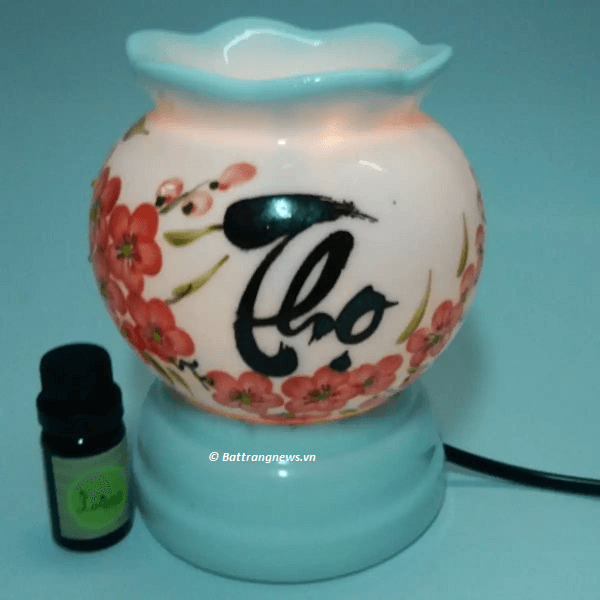 đèn xông tinh dầu lazada