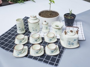 Bộ ấm chén men kem dáng thùng vẽ hoa đào xanh full phụ kiện