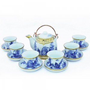 Ấm trà men lam vẽ trúc lâm thất hiền dáng vuốt bọc đồng